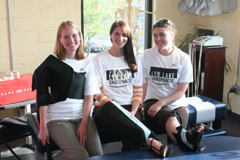Lyn Lake Chiropractic staff demonstrating Game Ready cold compression therapy